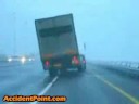 Truck flips over by strong wind